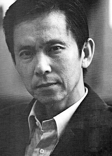 何家英照片.jpg